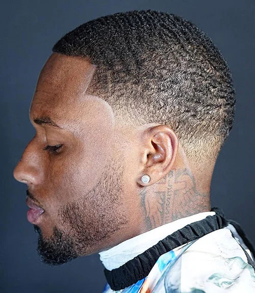 Taper fade haircut for Black men, clean tapered sides
