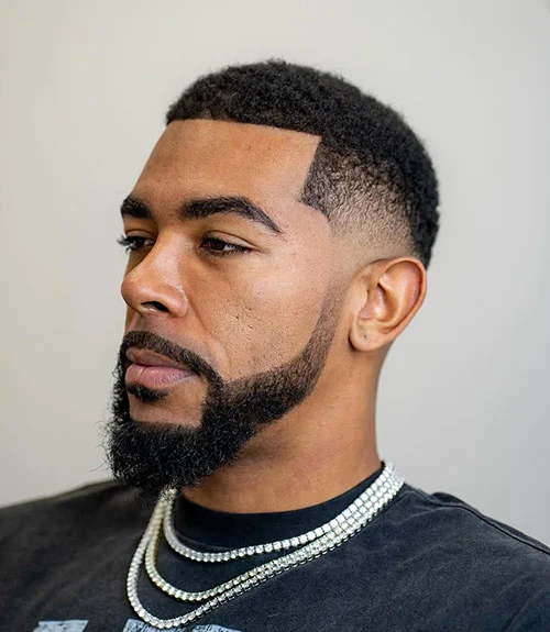 Drop fade haircut for Black men, curved drop fade