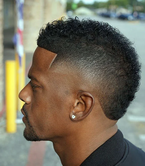 Burst fade haircut for Black men, rounded burst fade
