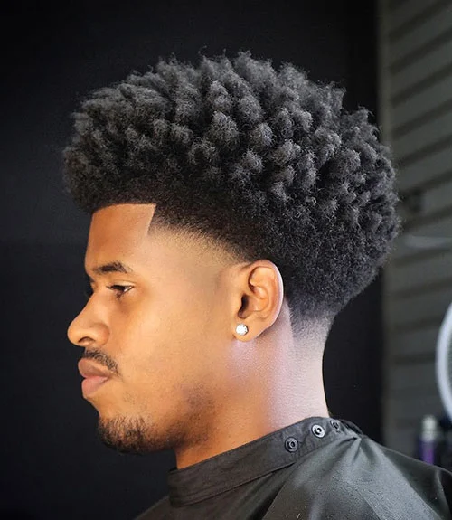 Sponged long afro fade haircut for Black men