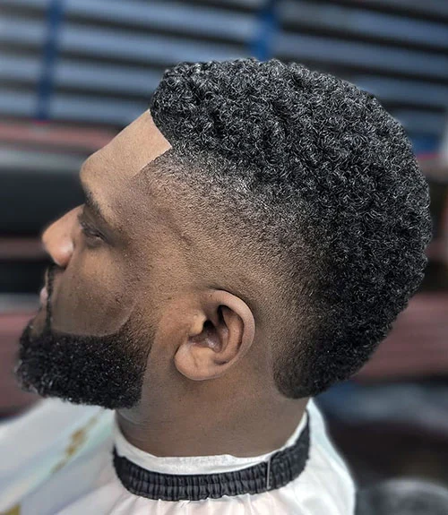 Burst fade mohawk haircut for Black men